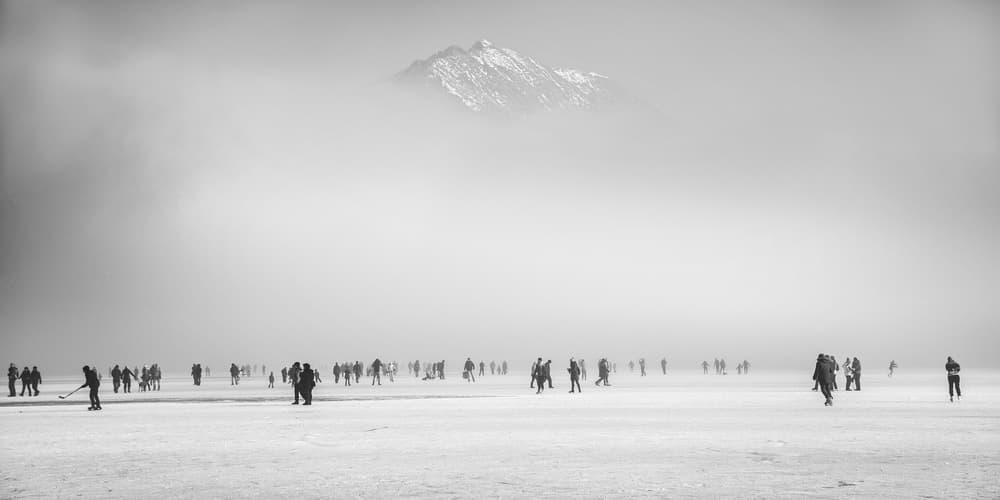 Misty Mountain Skaters by Ales Krivec — canvas wall art