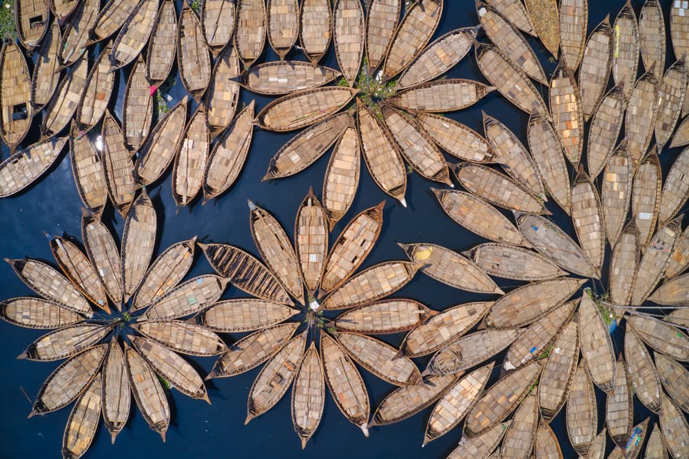 Floating Flower Boats by Azim Khan Ronnie — canvas wall art