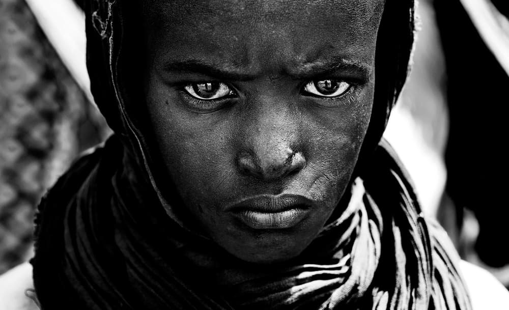 Intense Gaze Portrait by Joxe Inazio Kuesta Garmendia — canvas wall art
