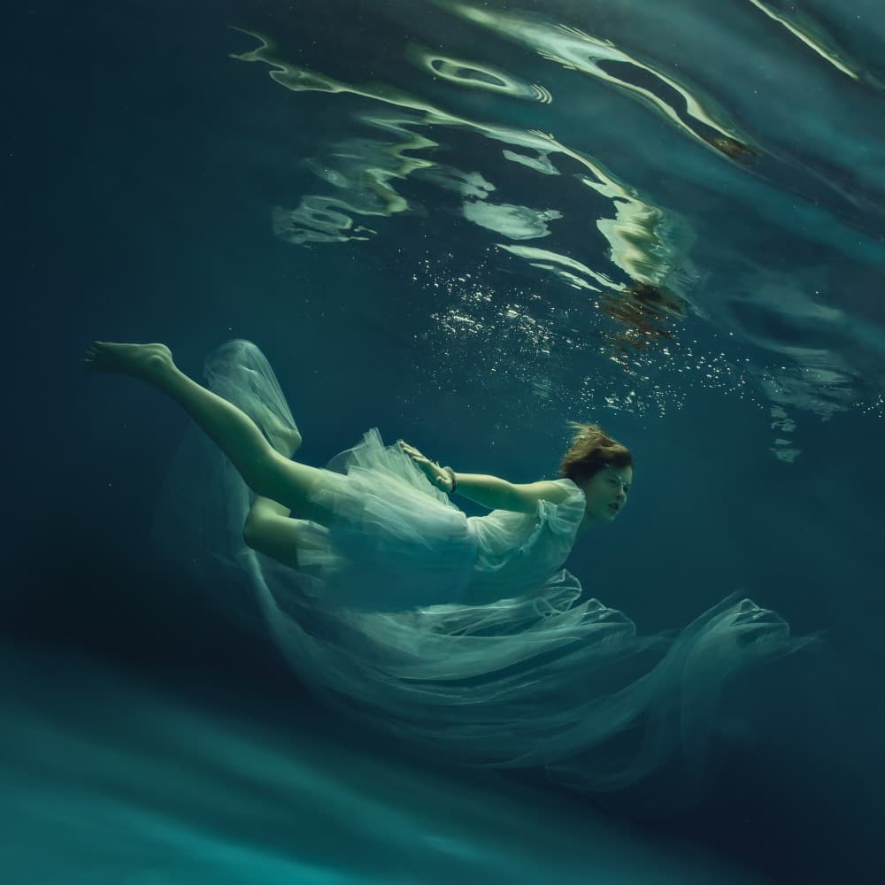 Graceful Underwater Swim by Dmitry Frizel — canvas wall art