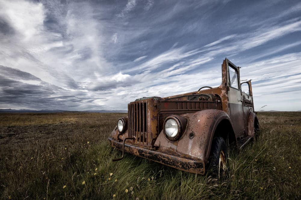 Abandoned Rusty Car Field by Þorsteinn H. Ingibergsson — canvas wall art