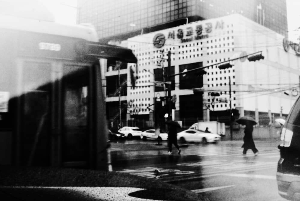 Moody City Rain by Mi Young Choi — canvas wall art