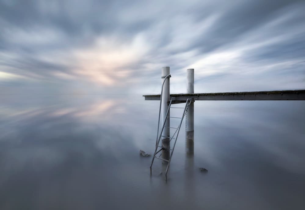 Dreamy Waterscape Pier by Joaquin Guerola — canvas wall art
