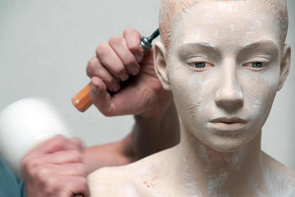 Sculpting a Human Bust by Vito Miribung — canvas wall art