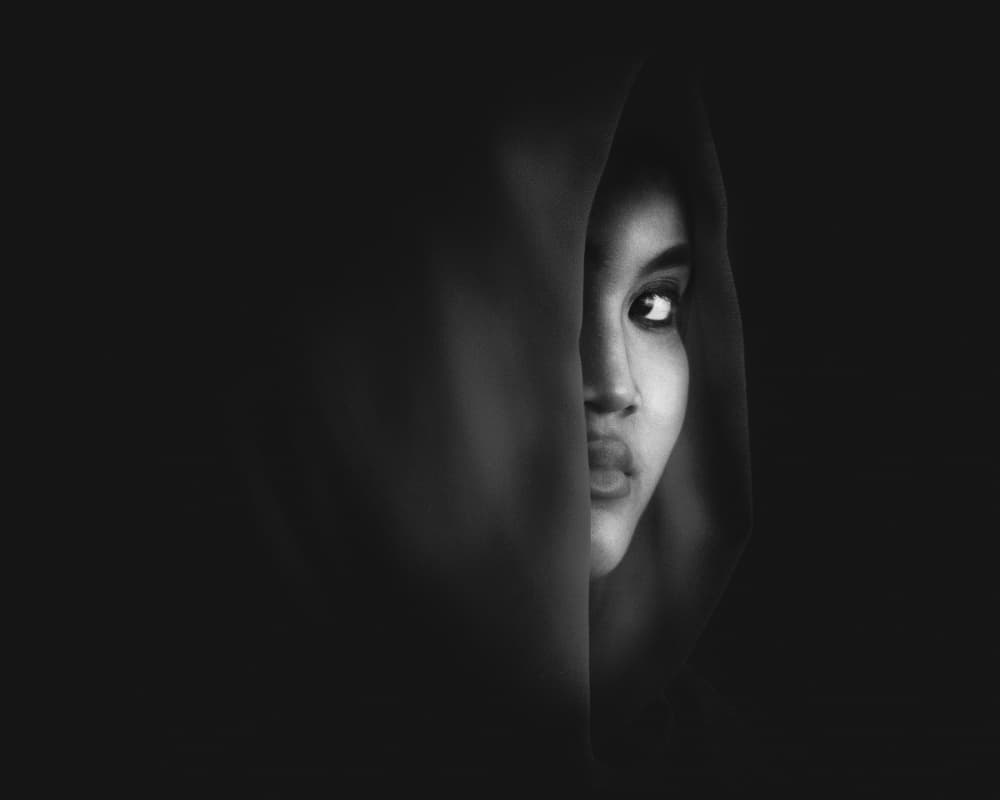 Mysterious Hooded Gaze by Ivan Marlianto — canvas wall art