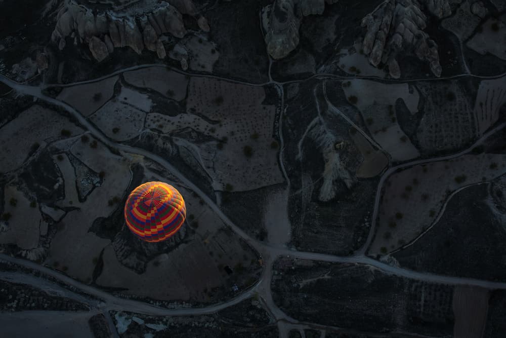 Glowing Balloon Landscape by Dan Mirica — canvas wall art