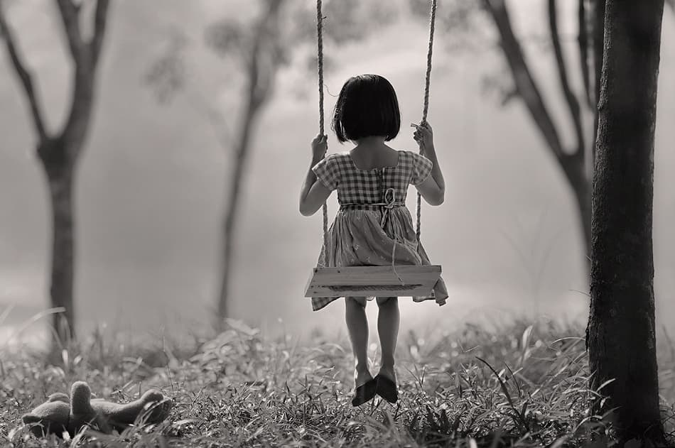 Wistful Girl Swinging by Raymond Sitanggang — canvas wall art