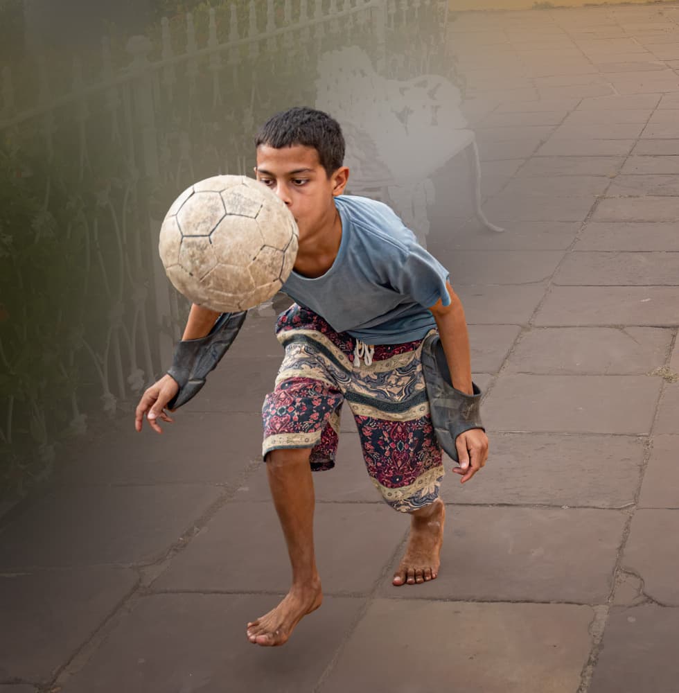 Dynamic Street Soccer Kid by Yuan Su — canvas wall art
