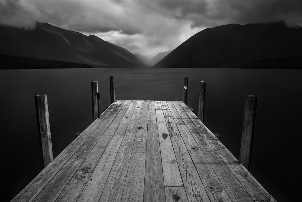Dramatic Mountain Lake Pier by Yan Zhang — canvas wall art