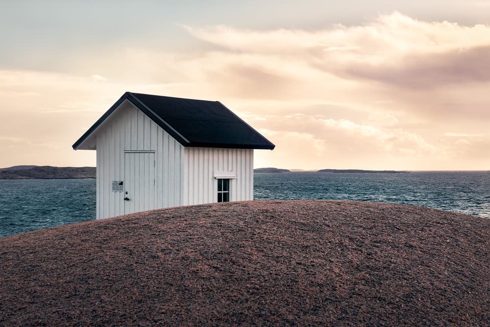 Serene Coastal House by Christian Lindsten — canvas wall art