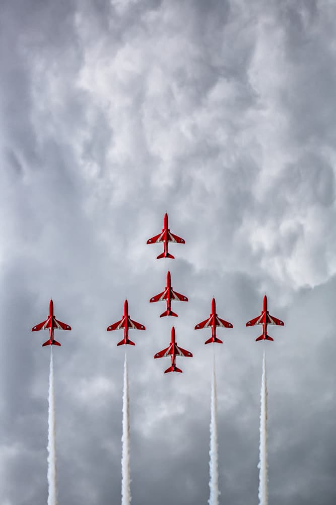 Red Jets Flying Formation by Leif Løndal — canvas wall art