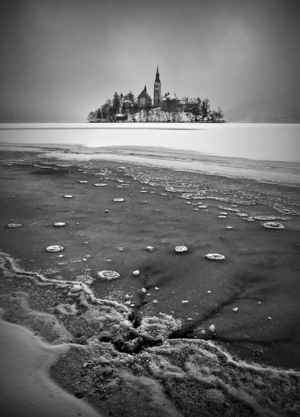 Frozen Island Church by Ales Komovec — canvas wall art