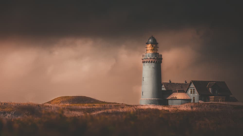 Moody Coastal Lighthouse by Marcus Hennen — canvas wall art