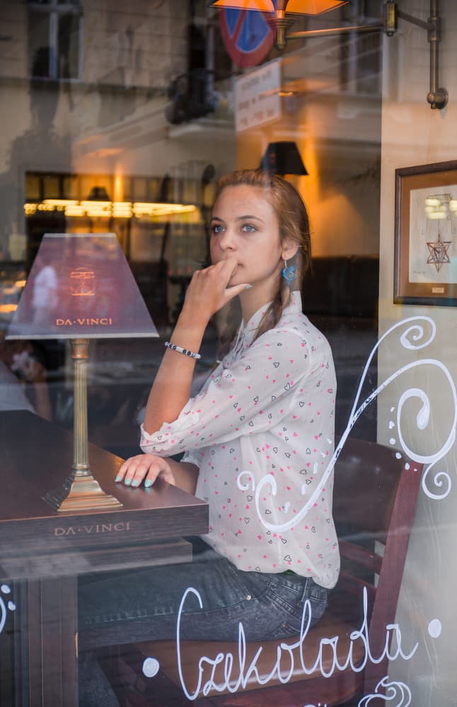 Thoughtful Cafe Gaze by Miroslaw Prybinski — canvas wall art