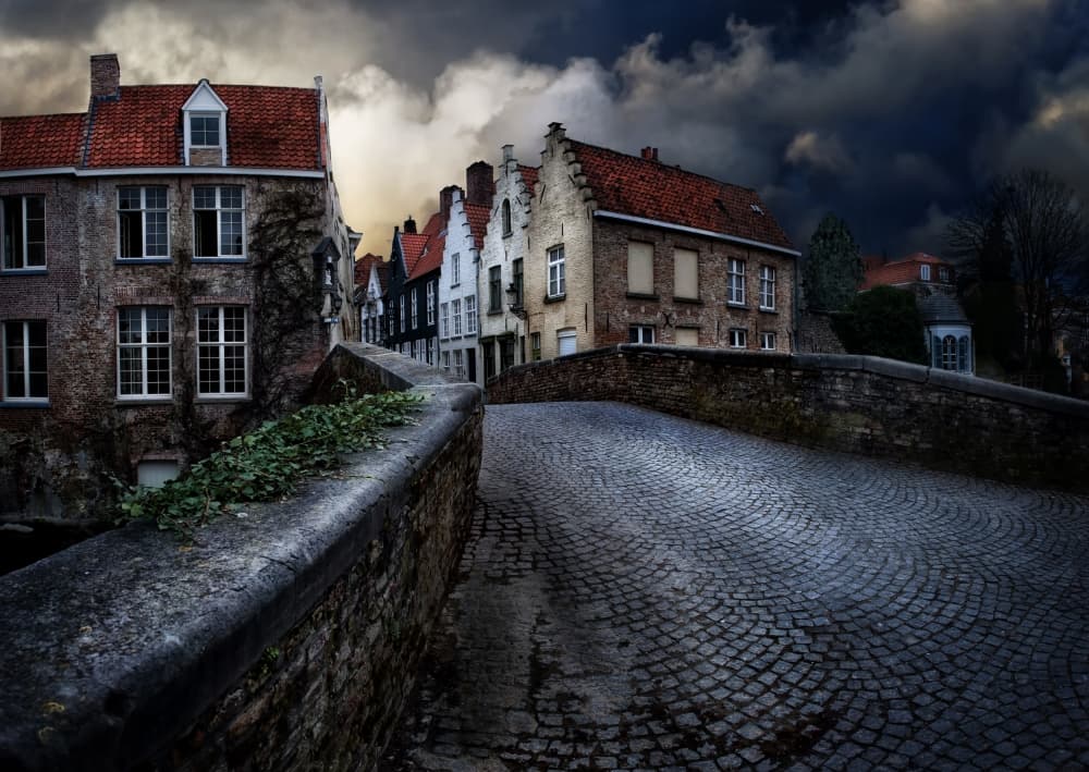 Moody Cobblestone Bridge by Piet Flour — canvas wall art