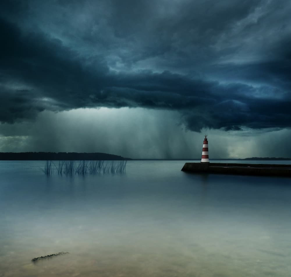 Stormy Lake Lighthouse by Mindaugas Žarys — canvas wall art