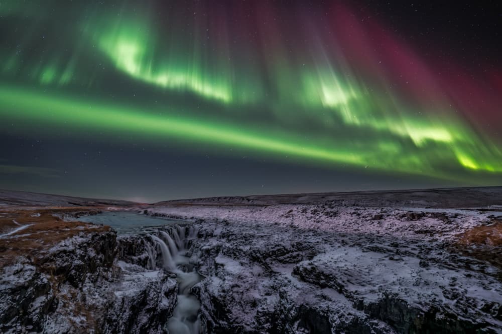 Vibrant Northern Lights Waterfall by James Zhen Yu — canvas wall art