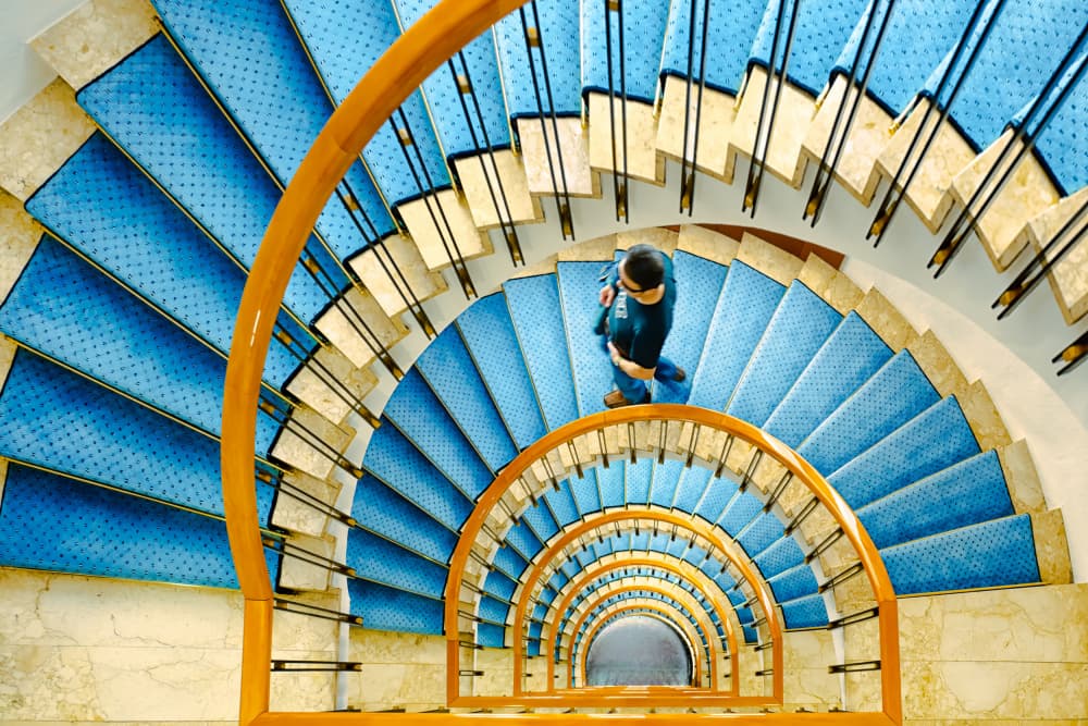 Winding Blue Staircase by Leah Guo — canvas wall art