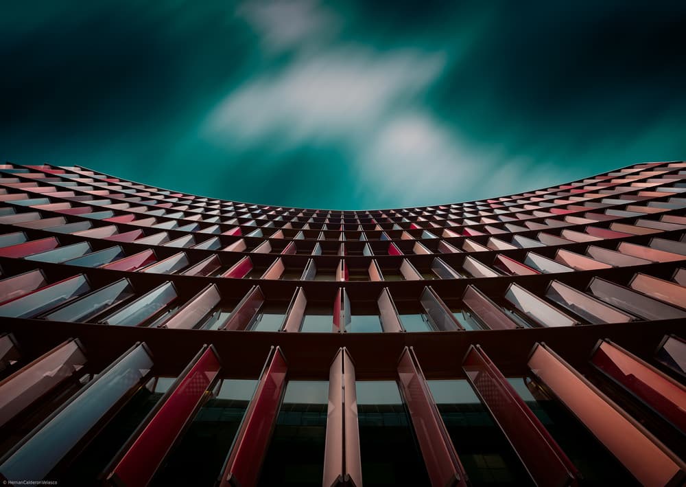 Vibrant Building Facade by Hernan Calderon Velasco — canvas wall art