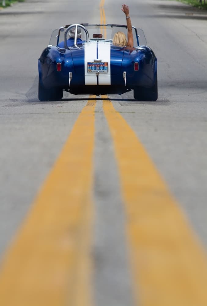Blue Roadster Waving Drive by David Lambert — canvas wall art