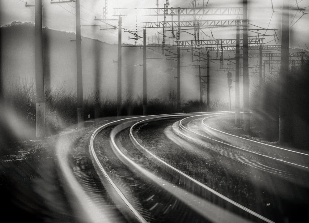Curving Railway Light by Dmitry Nesvetaylov — canvas wall art