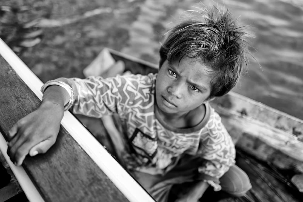 Young Gaze in Boat by Kieron Long — canvas wall art