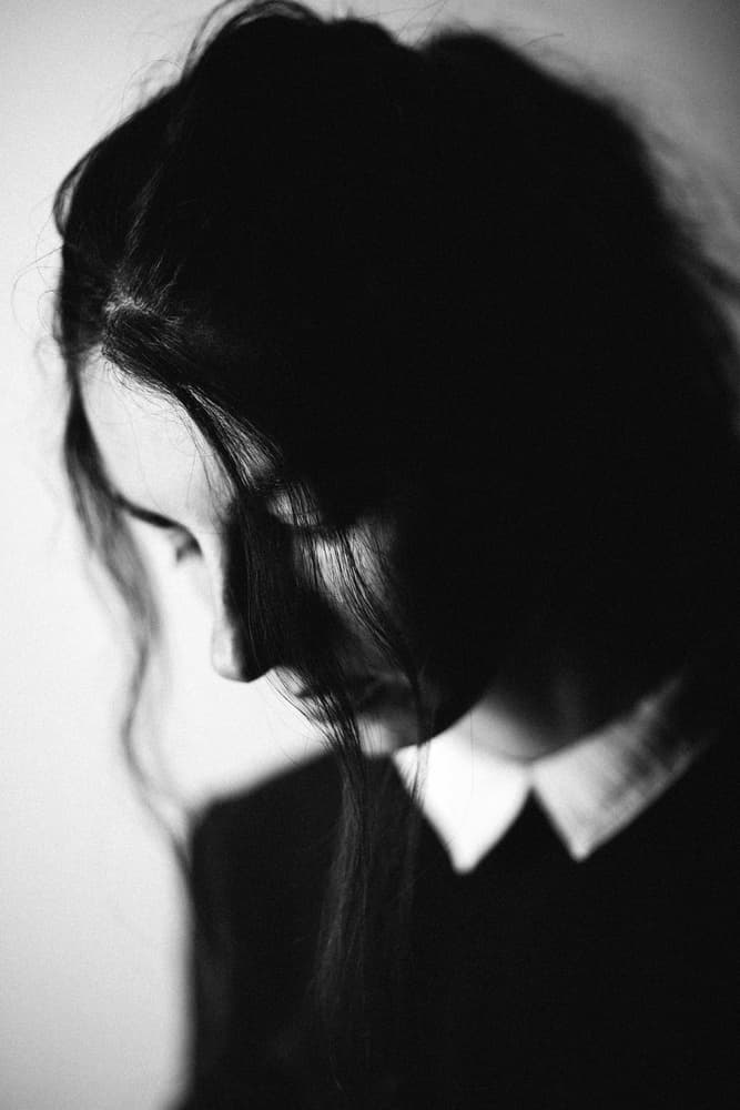 Shadowed Thoughtful Woman by Artem Vasilenko — canvas wall art