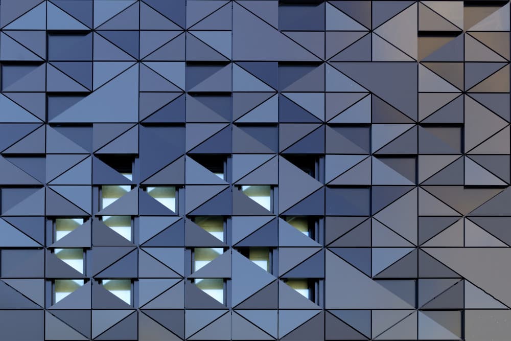 Blue Geometric Facade by Theo Luycx — canvas wall art
