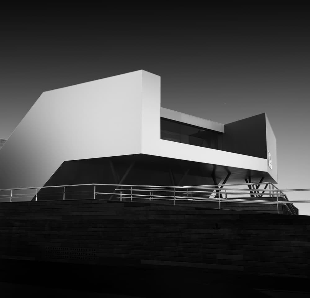 Geometric White Building by Amaya Saez — canvas wall art