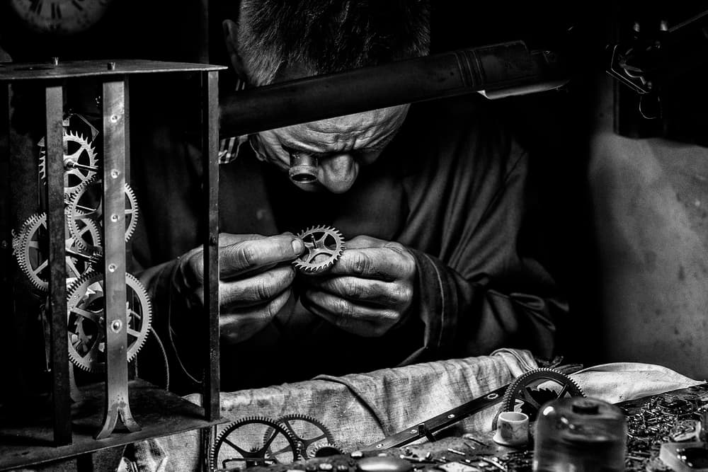 Master Clockmaker's Focus by Manu Allicot — canvas wall art