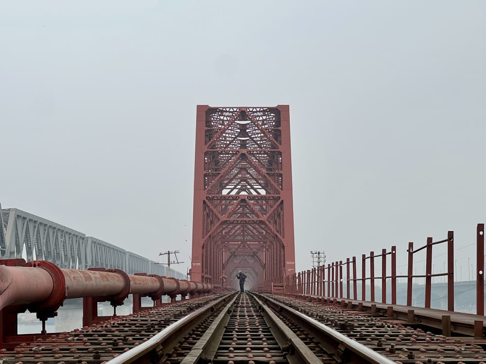 Red Railway Bridge Walk by Siraj Akram Kayes — canvas wall art