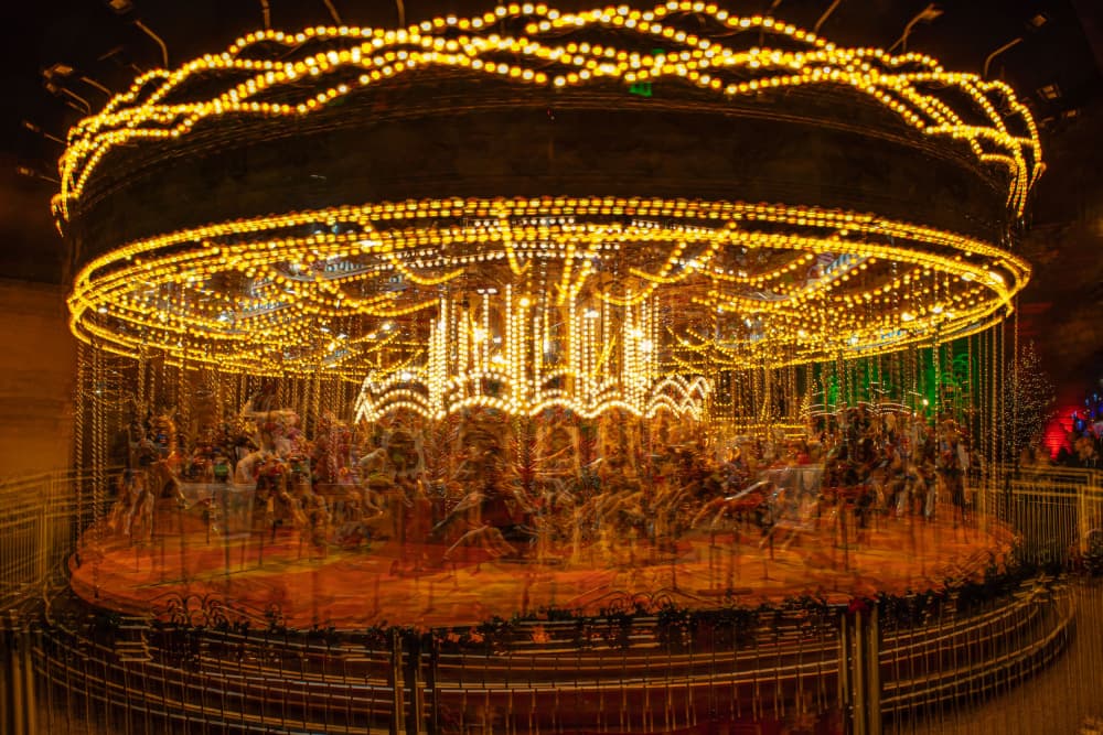 Spinning Carousel Lights by Pawel Majewski — canvas wall art