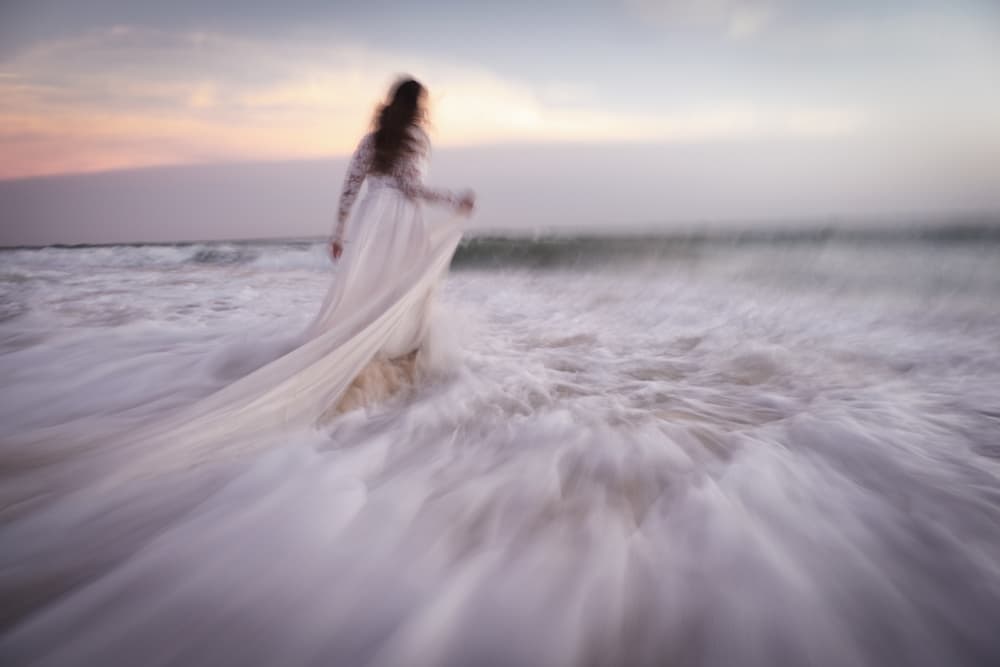Flowing Dress Beach Sunset by Bingo Z — canvas wall art