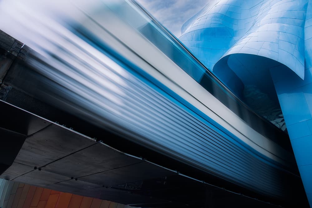 Train Blurs Blue Architecture by Dani BS. — canvas wall art