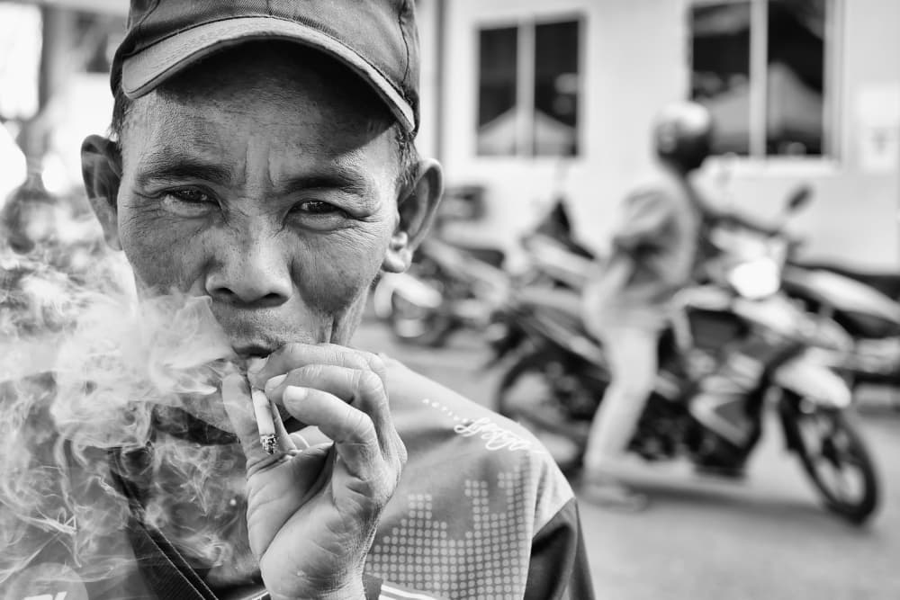 Candid Street Smoker by Kieron Long — canvas wall art