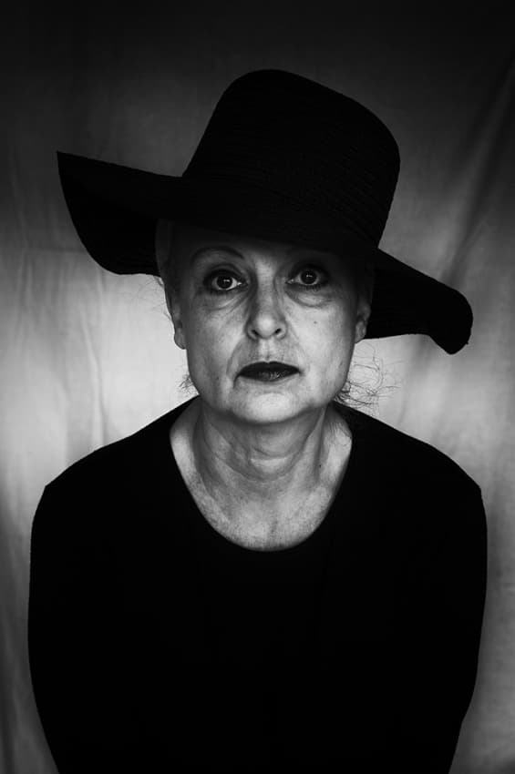 Elegant Woman Black Hat by Angelika Martha Himburg — canvas wall art