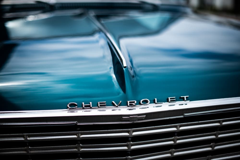 Classic Teal Car Front by Tim Mossholder — canvas wall art