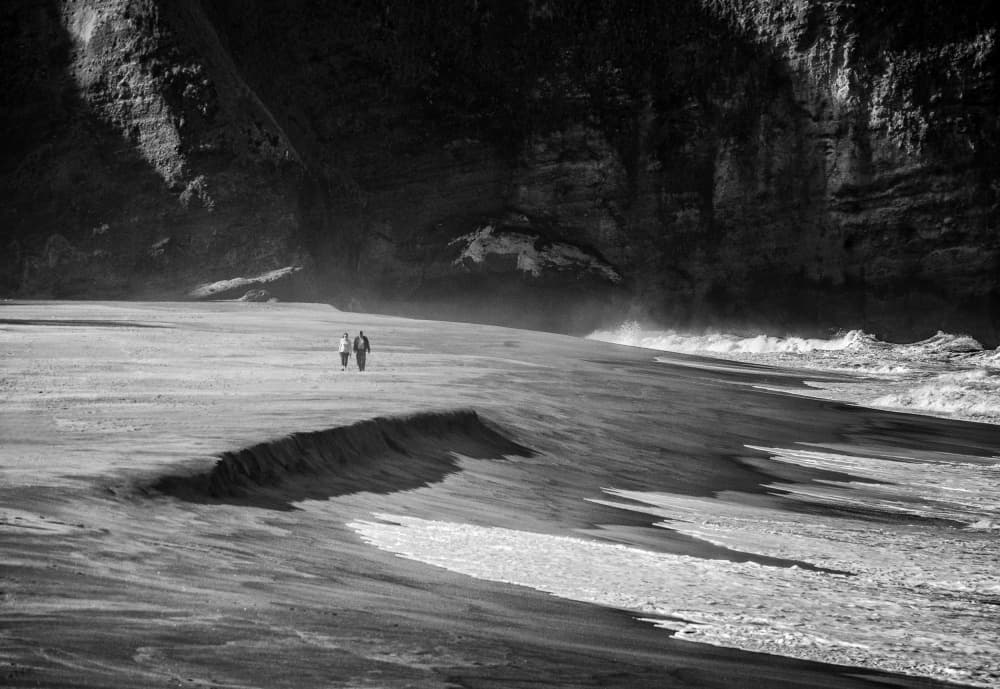Couple on Dramatic Beach by Fernando Abreu — canvas wall art