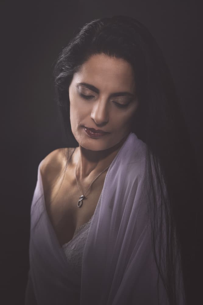 Serene Woman Portrait by Sharon Levy — canvas wall art