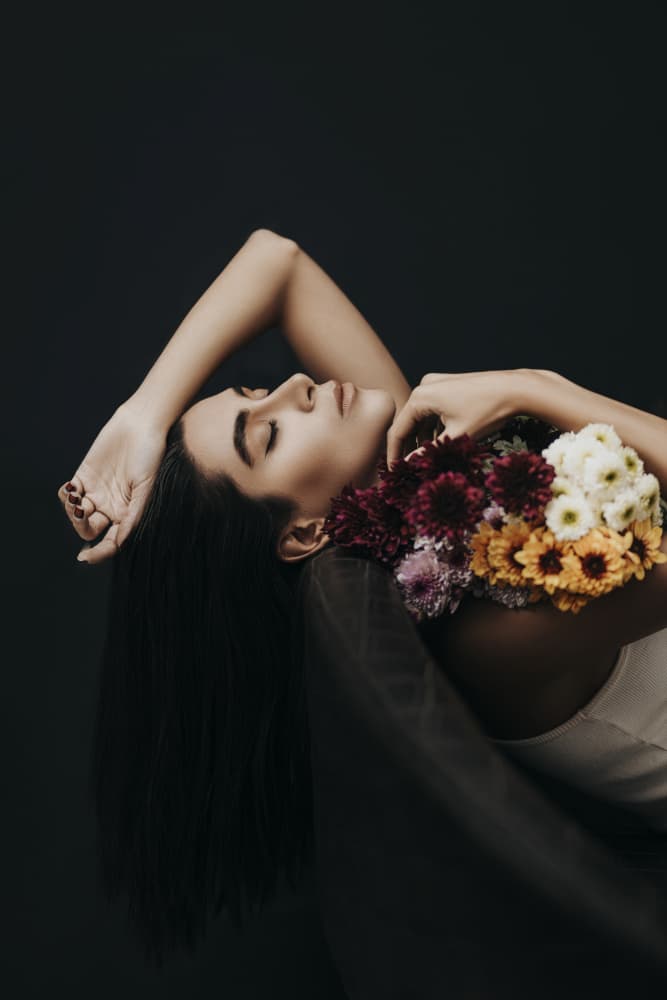 Serene Woman with Flowers by Amin Hamidnezhad — canvas wall art