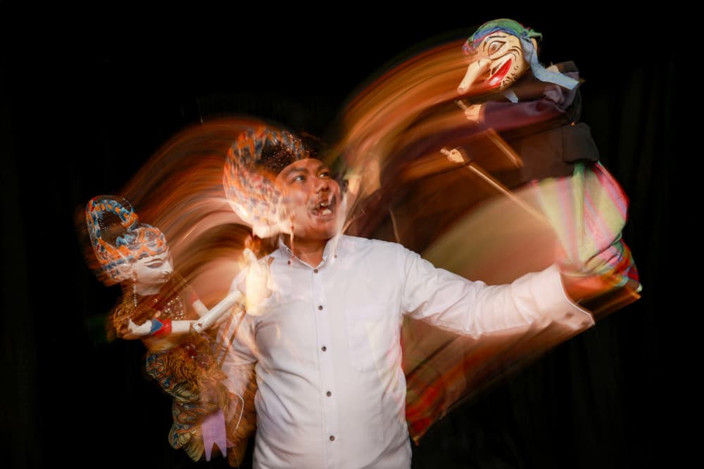 Puppeteer in Motion by Ihsan M — canvas wall art