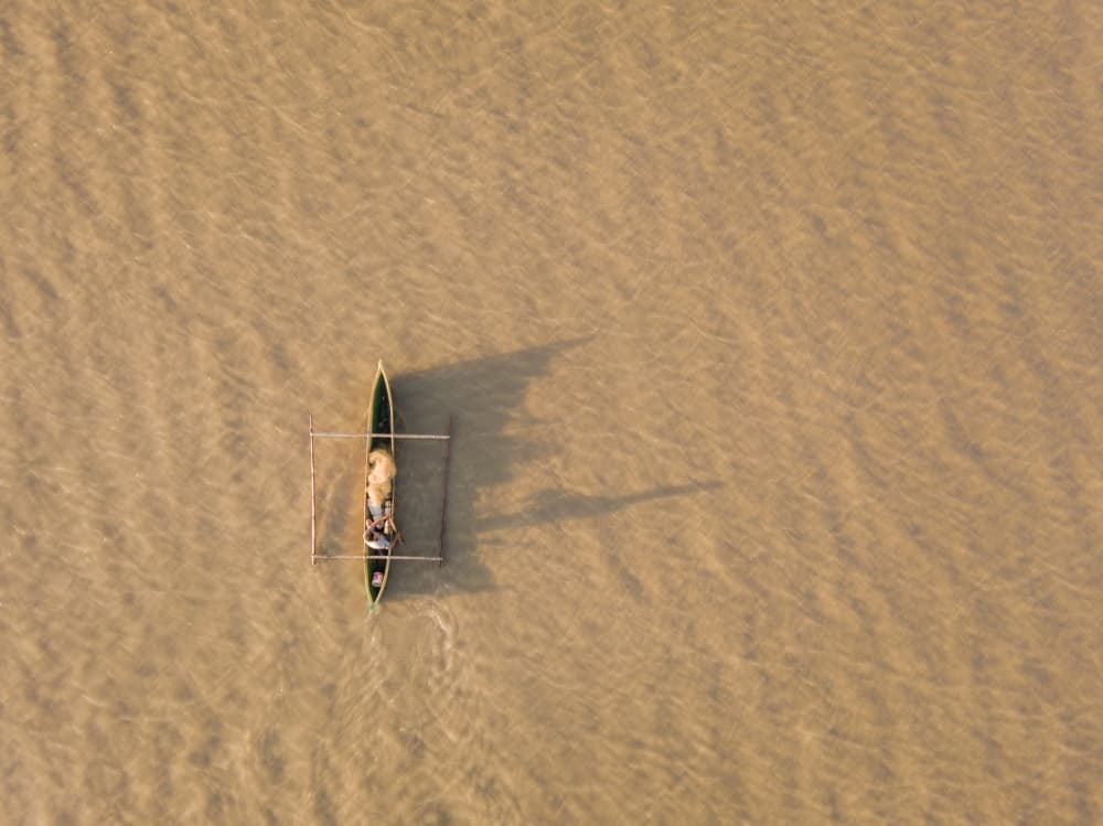 Aerial River Canoe by Joao Galamba — canvas wall art