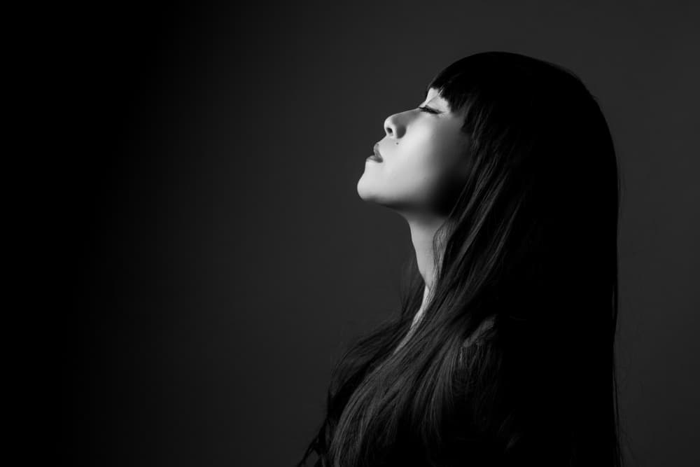 Peaceful Woman Looking Up by Masami Kondo — canvas wall art