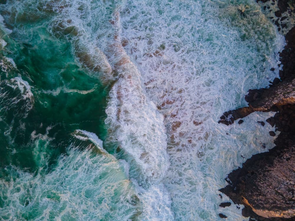 Ocean Waves Crashing Shore by Anna Kirchner — canvas wall art