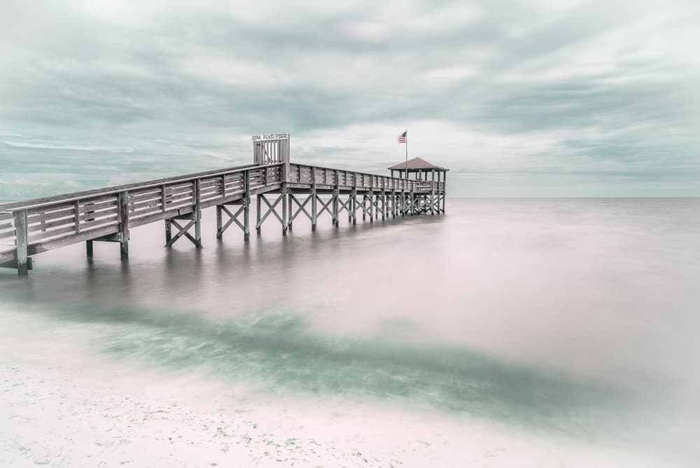 Calm Coastal Pier by Martin Steeb — canvas wall art