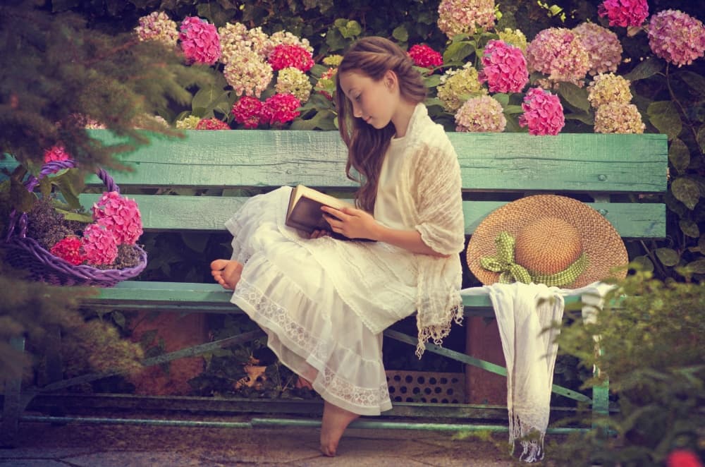 Peaceful Garden Reading by Elena Karagyozova — canvas wall art