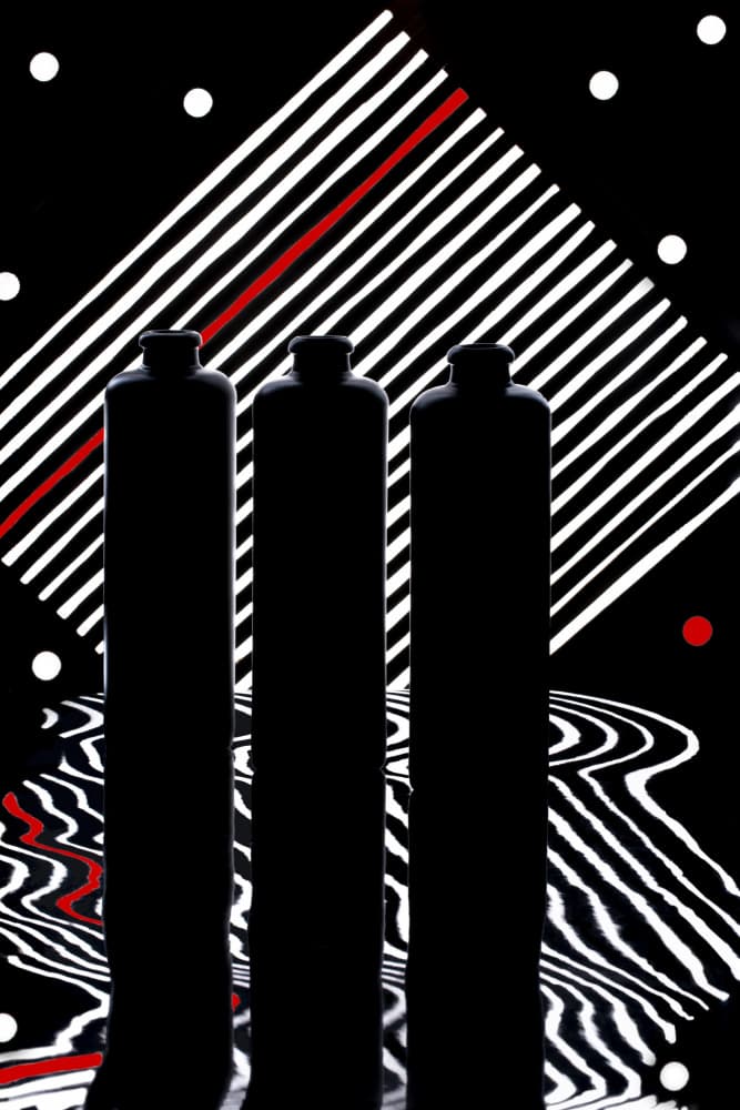 Three Bottles Geometric Red by Brig Barkow — canvas wall art