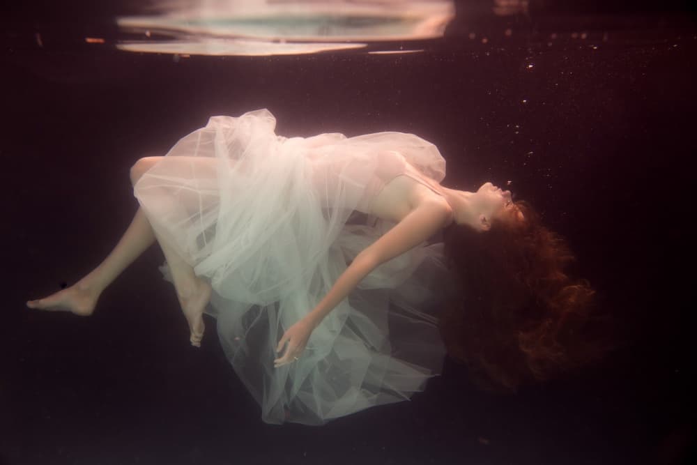 Woman Floating Underwater by Gabriela Slegrova — canvas wall art