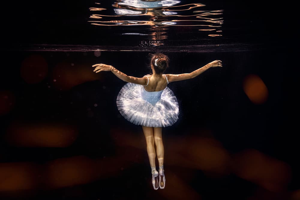 Graceful Underwater Dancer by Petr Kleiner — canvas wall art