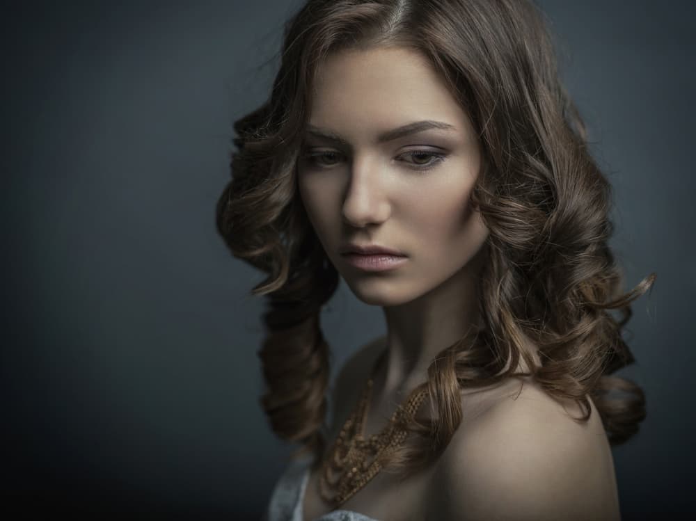 Pensive Young Woman by Yuri Shevchenko — canvas wall art